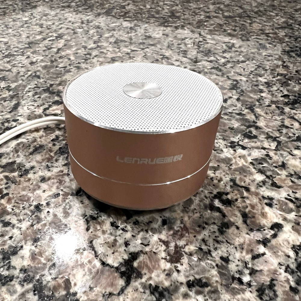 LENRUE Portable Wireless Bluetooth Speaker in Rose Gold.